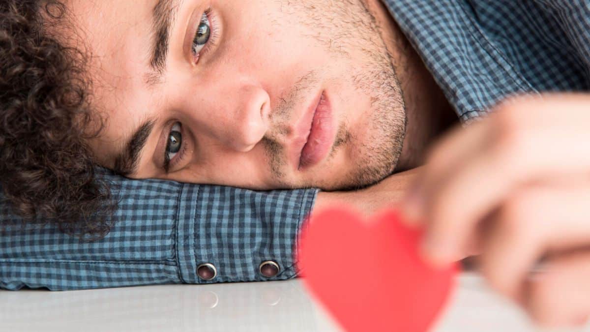 signs he wants you but is holding back