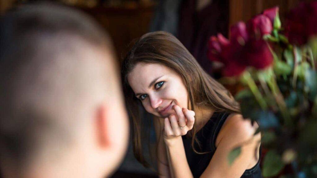 signs she is secretly attracted to you
